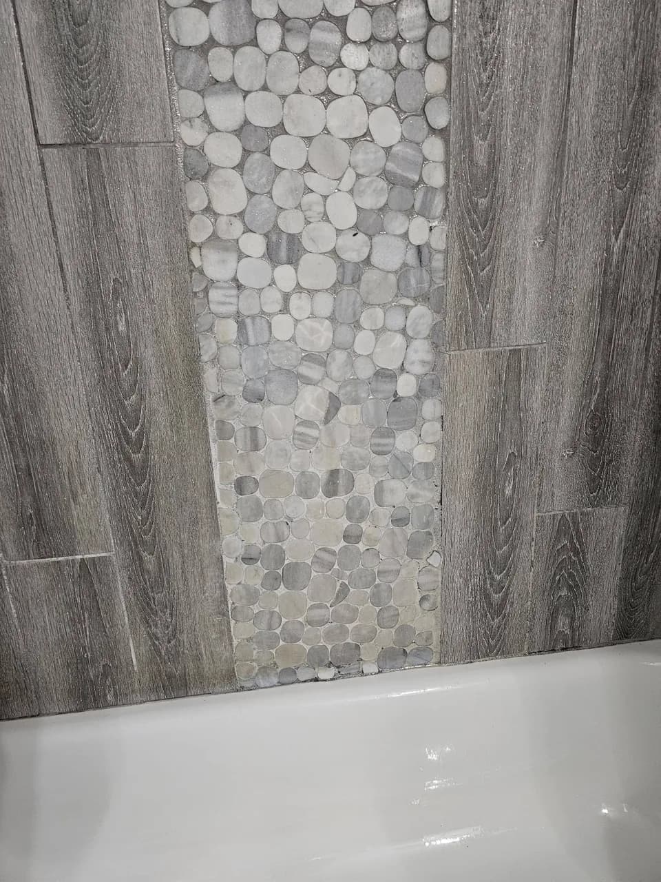 Clean shower tile and tub surround from New Star Cleaning work